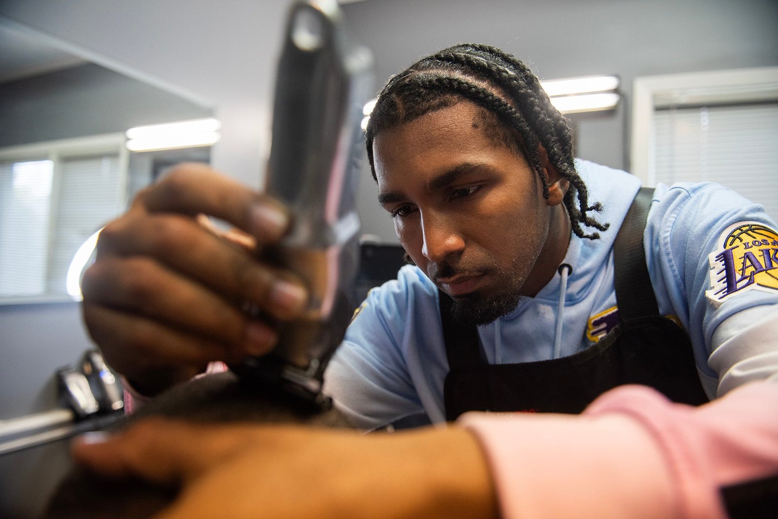 Denzy cutting hair