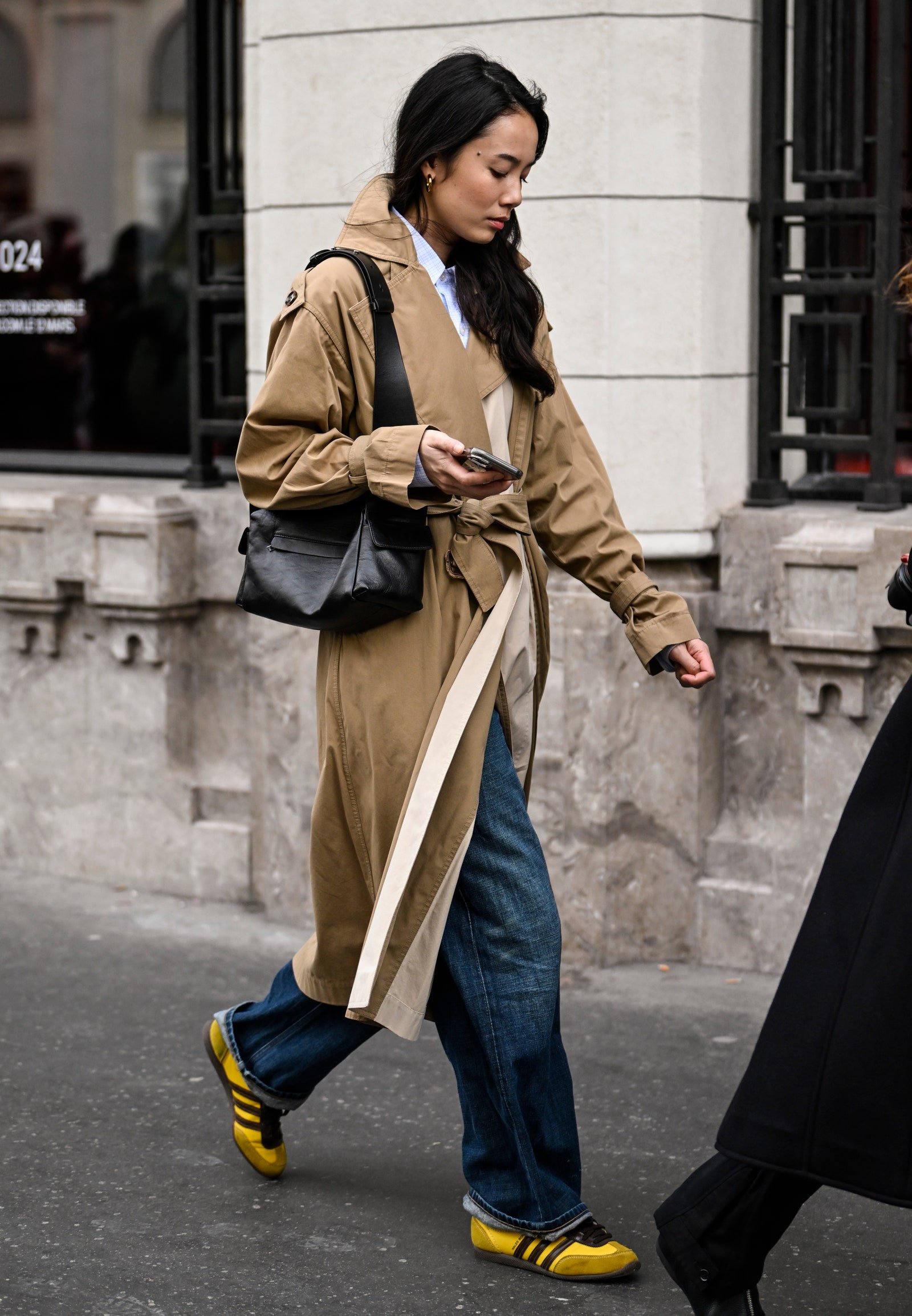 Pink trench coat with baggy jeans