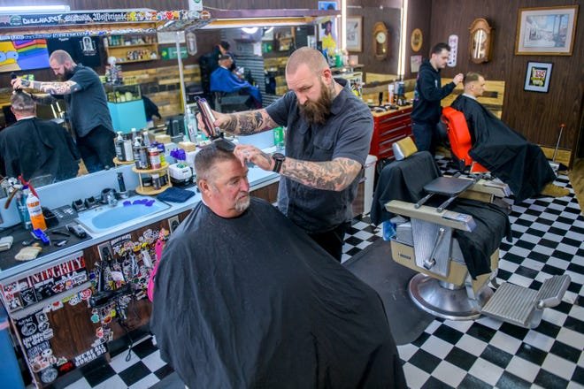 Peoria barbershop’s rich history preserved by new owner