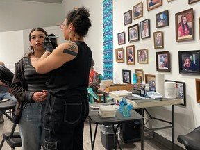 Regina artist showcases live Indigenous face tattoo ritual
